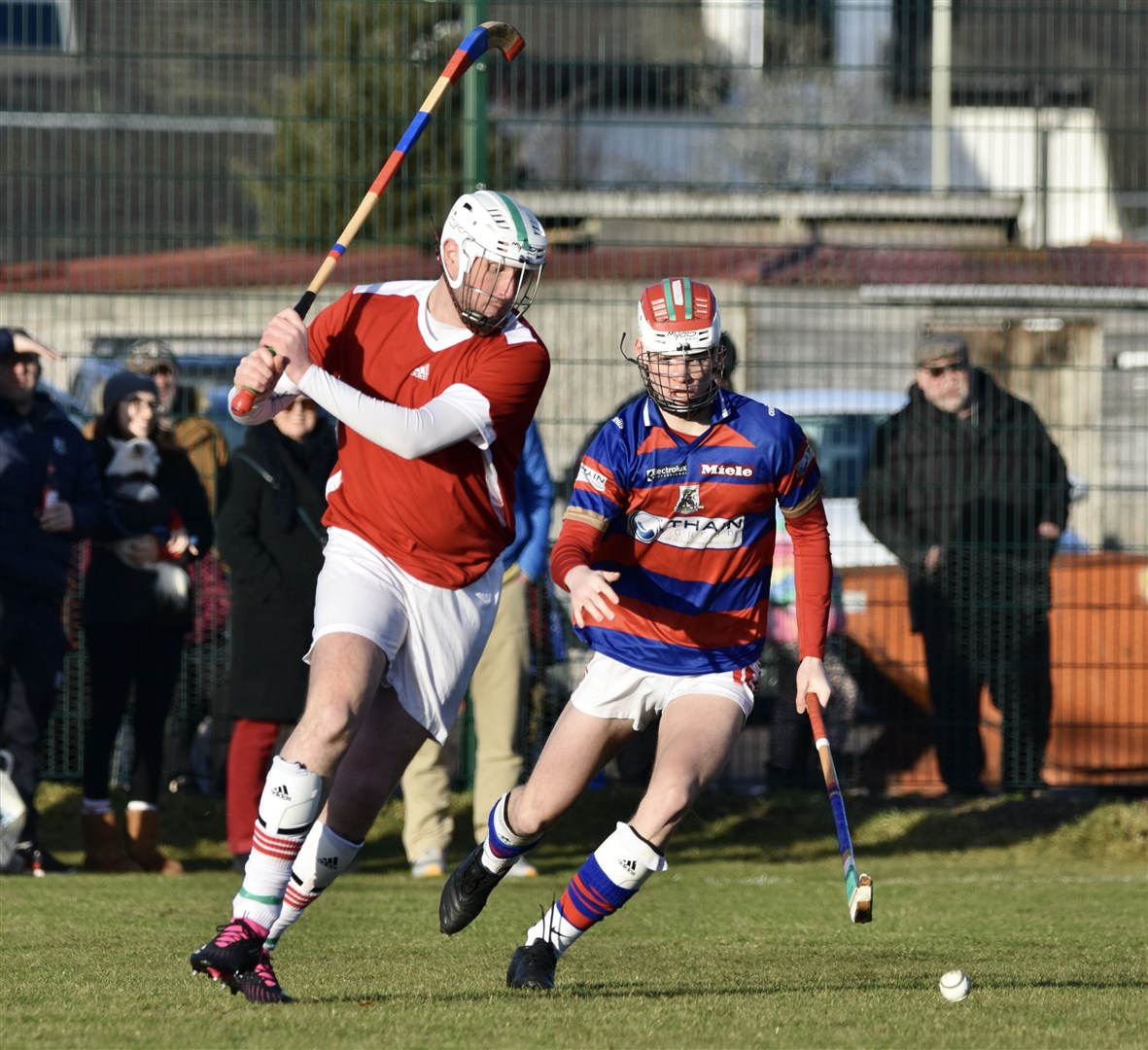 Pete Dickson gets to the ball ahead of Bobby Russell.