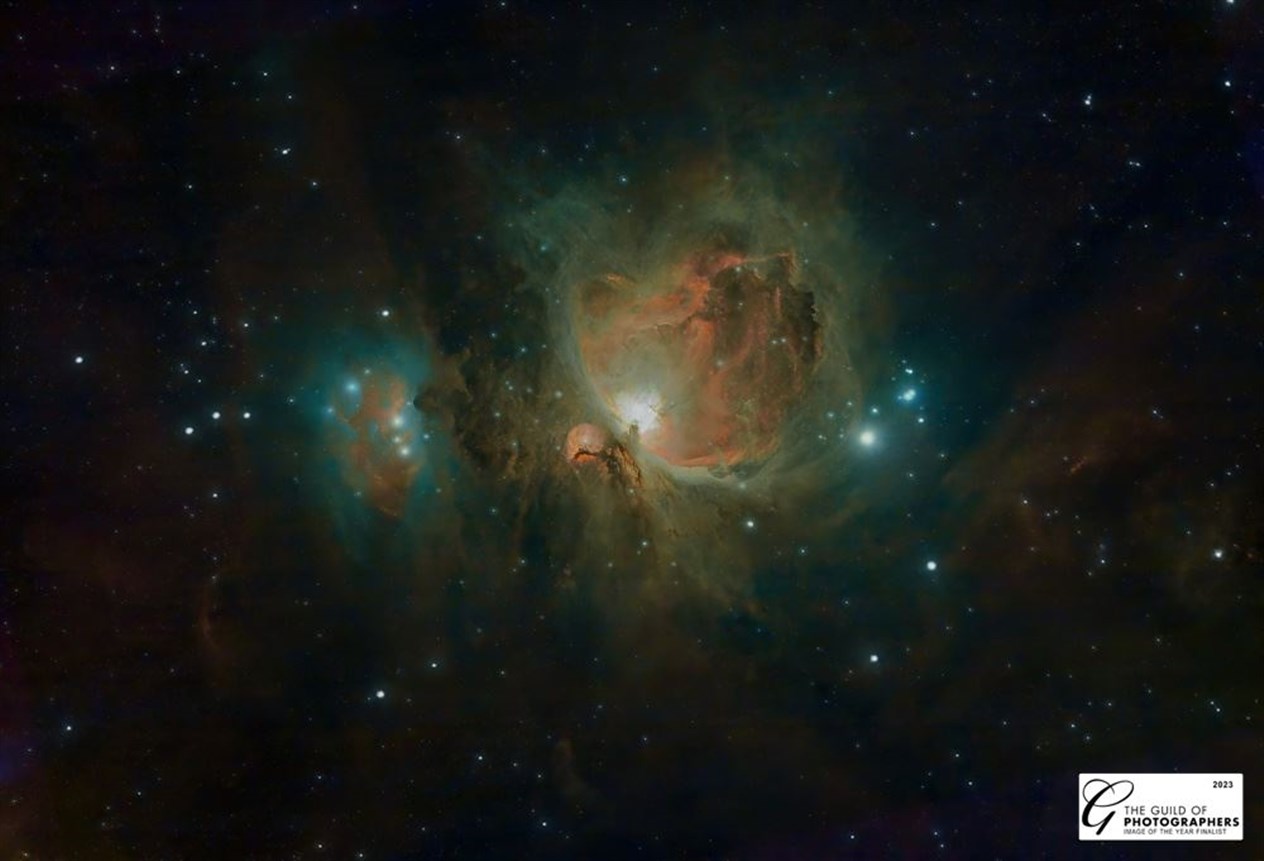 A name more familiar... the Orion Nebula in the Milky Way, being south of Orion's Belt in the constellation of Orion.
