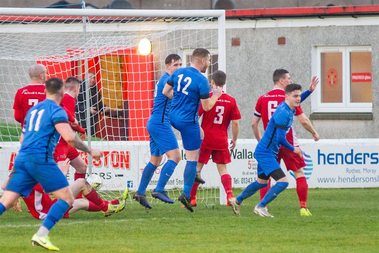 Liam Taylor (right) celebrates after giving Strathspey Thistle the lead from a Rennie corner on Saturday.