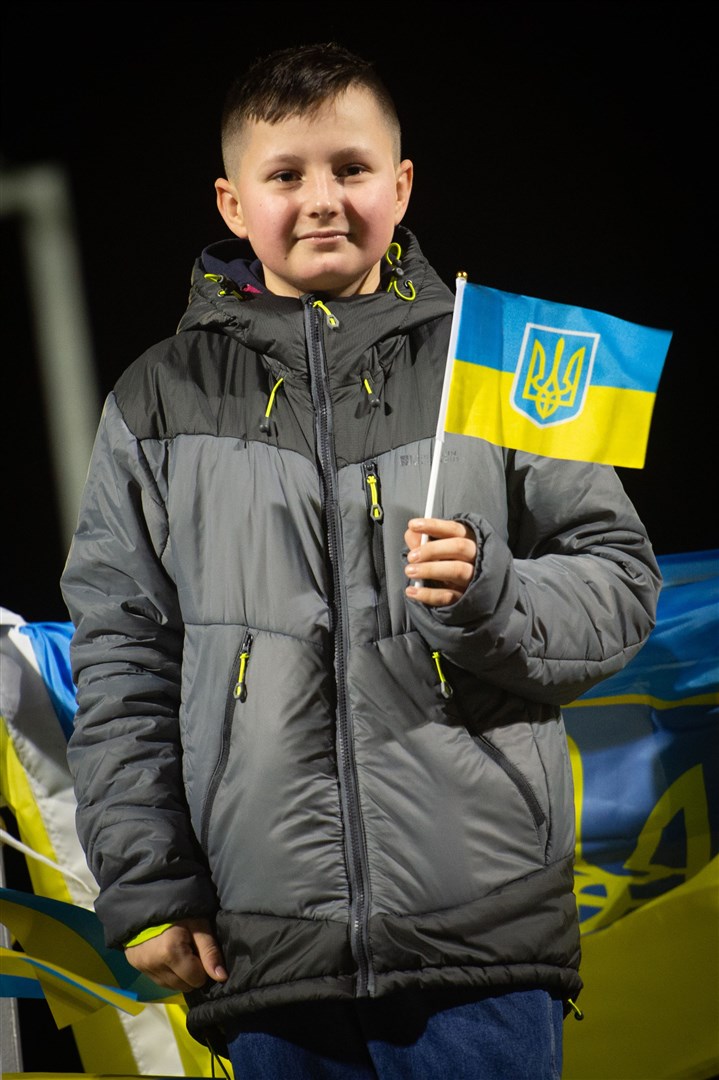 Boy with flag. Picture: Callum Mackay..