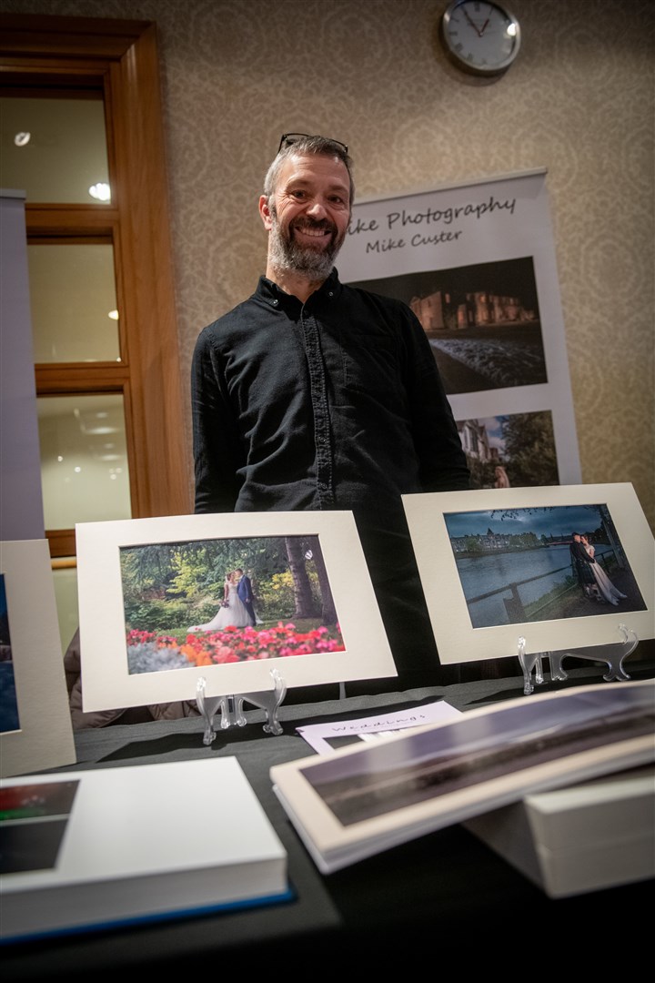 Mike Custer, of Fitlike Photography, showing off some of his work. Picture: Callum Mackay.