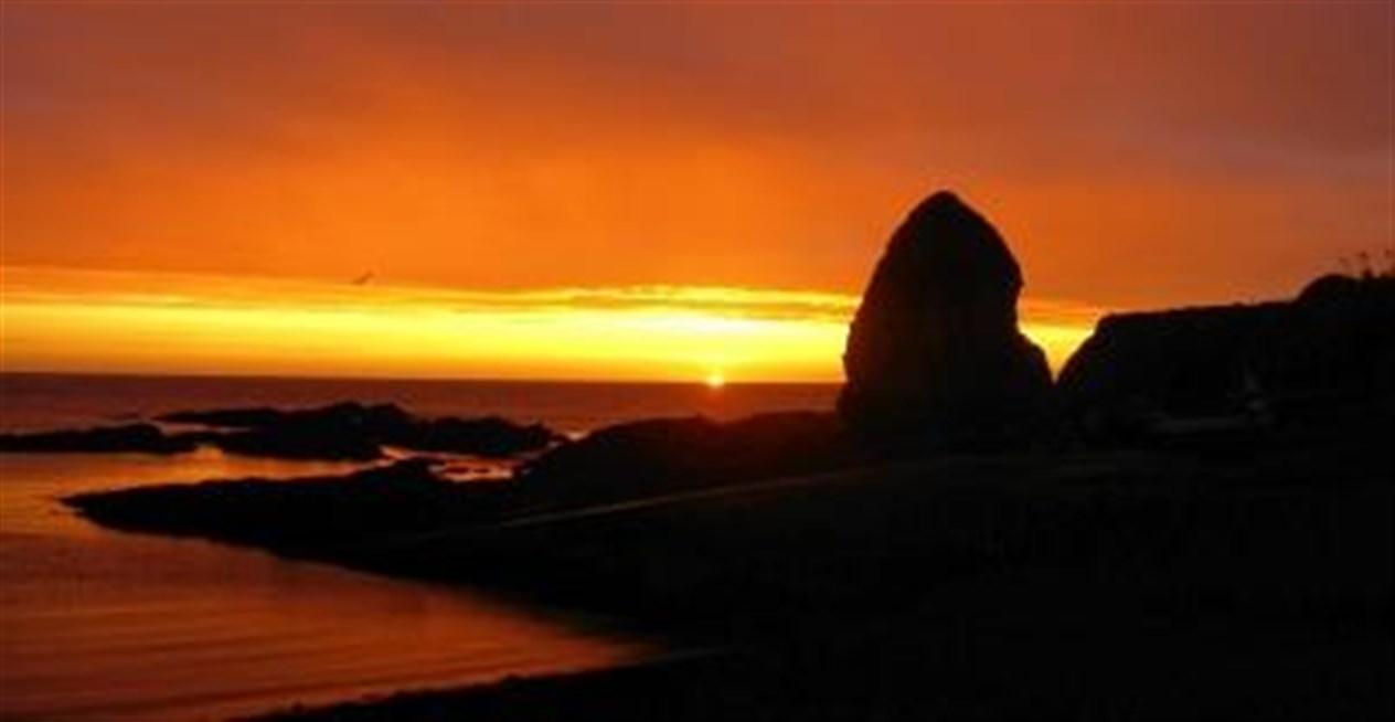 Sunrise over Staxigoe by Alan Hendry.