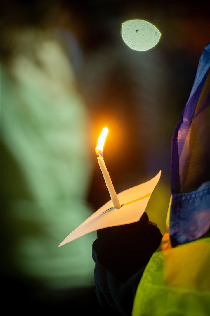 Lit candle. Picture: Callum Mackay..