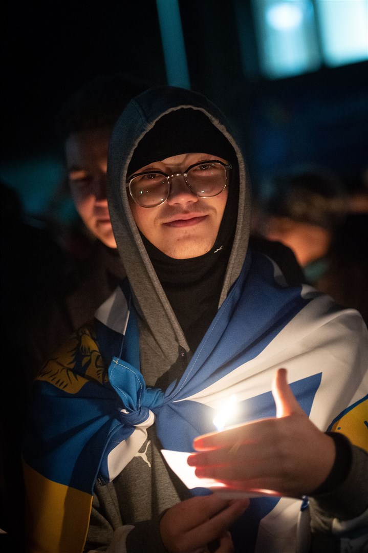 Boy with candle. Picture: Callum Mackay..