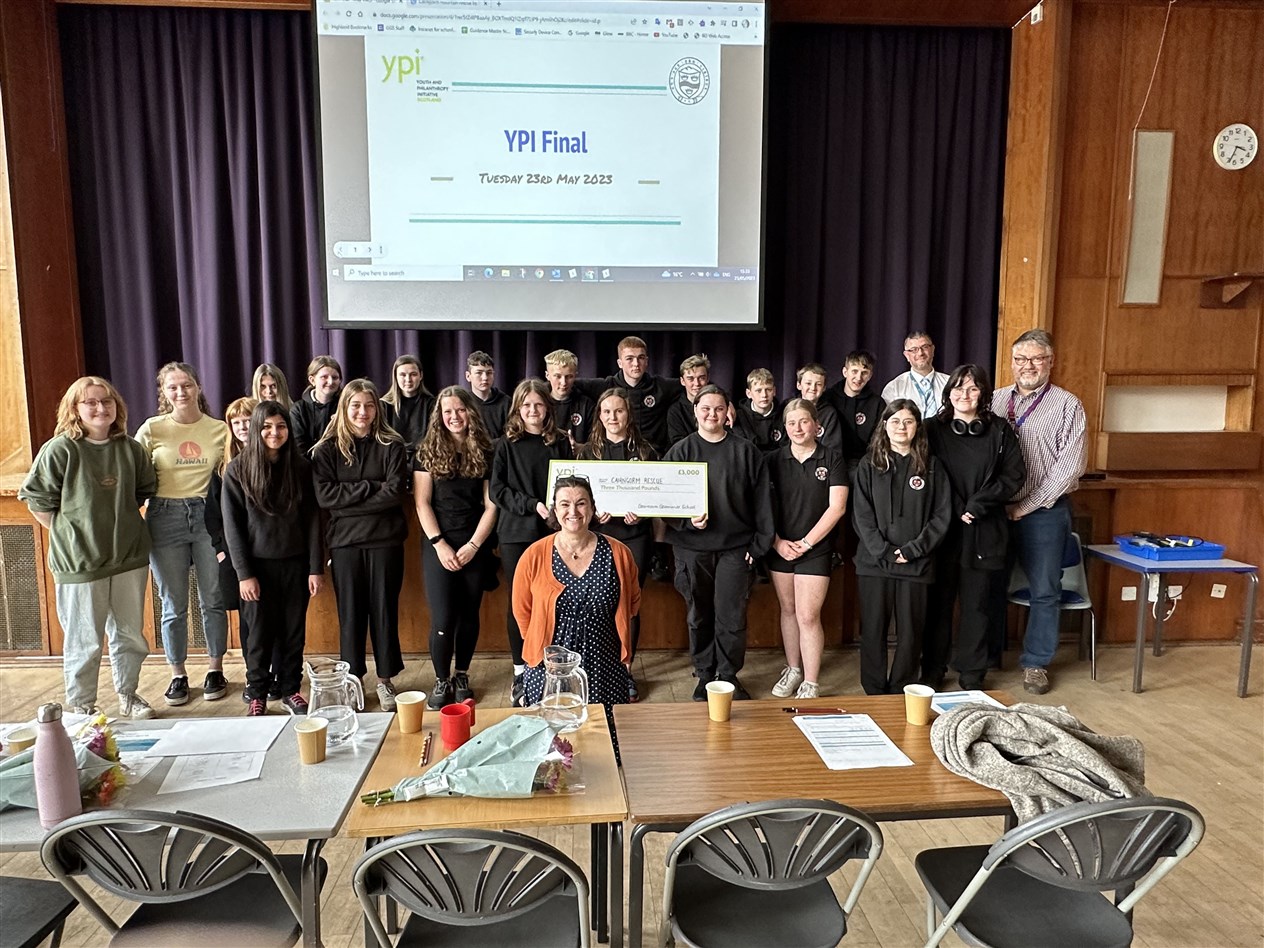 Mrs McGonigal, her fellow judges and the S2 finalists.