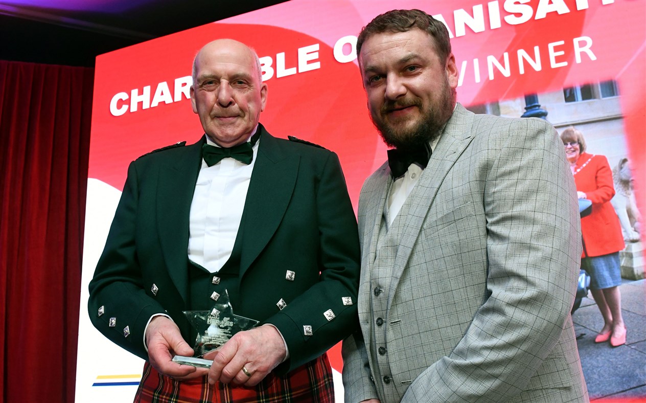 Ross Sharp (left) accepted the award for Highland & Islands Blood Bikes for the Charitable Organisation Award. Award presented by Kris Brown of W M Donald. Picture: James Mackenzie.