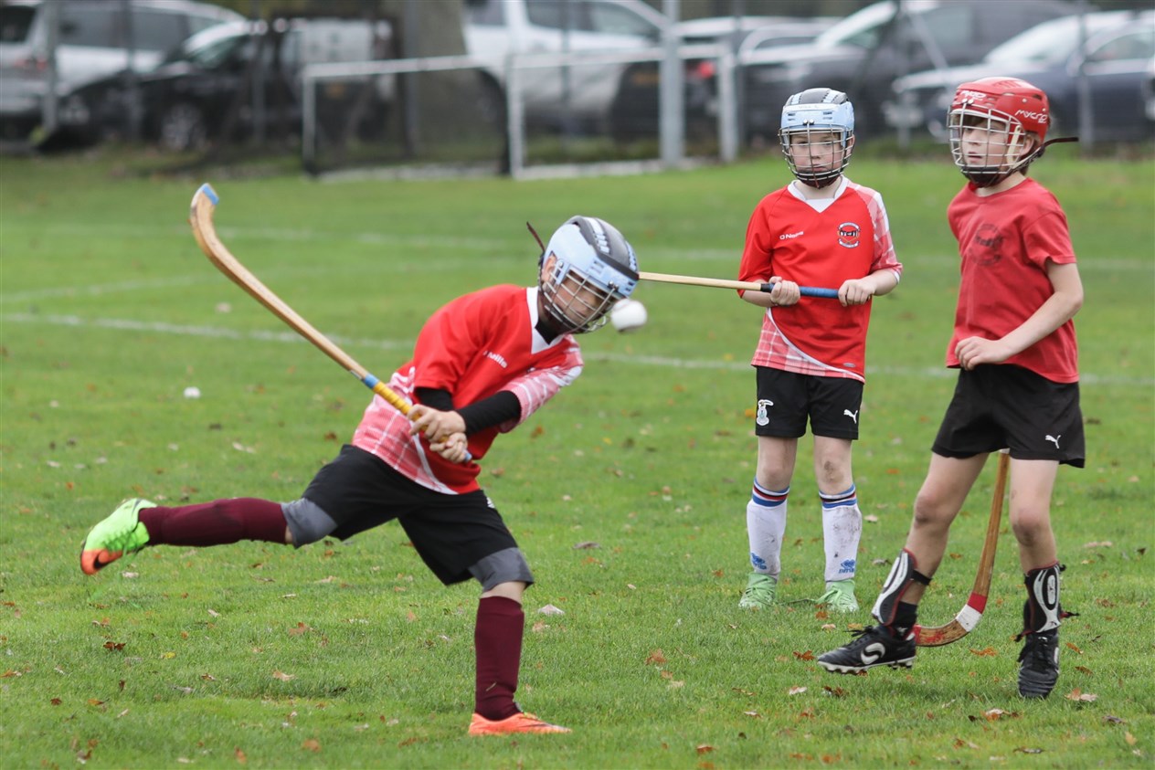 Gaelic Medium shinty Coaching Session taking place prior to the men and women's Mod Shinty Cup matches at Bught Park Inverness at The Royal National Mòd 2021 in Inverness, Scotland