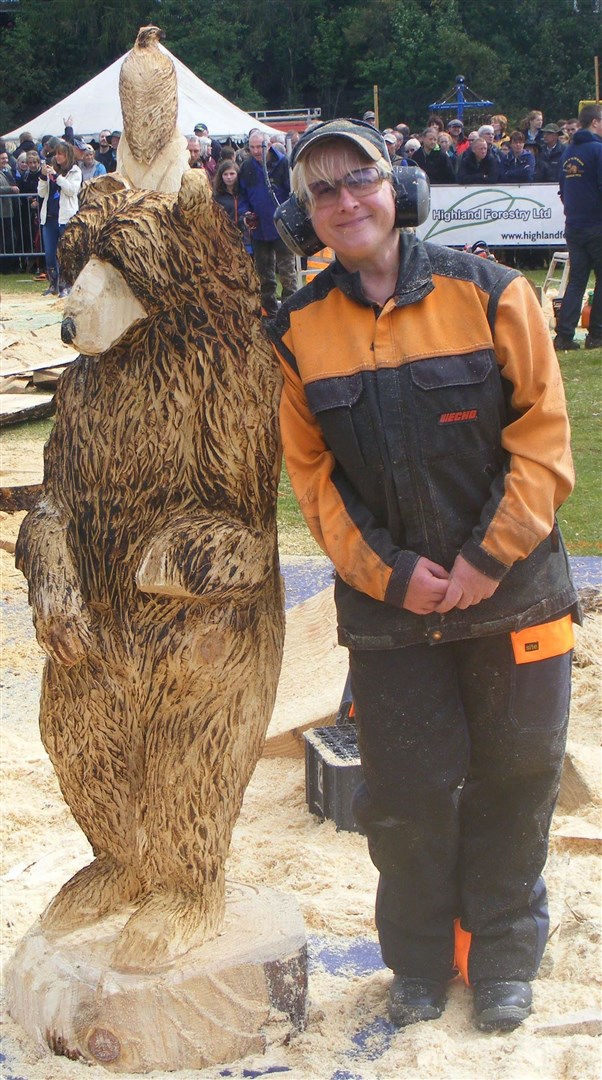 Pals! Carrie Yuen, of Northants, goes shoulder to shoulder with her new friend.