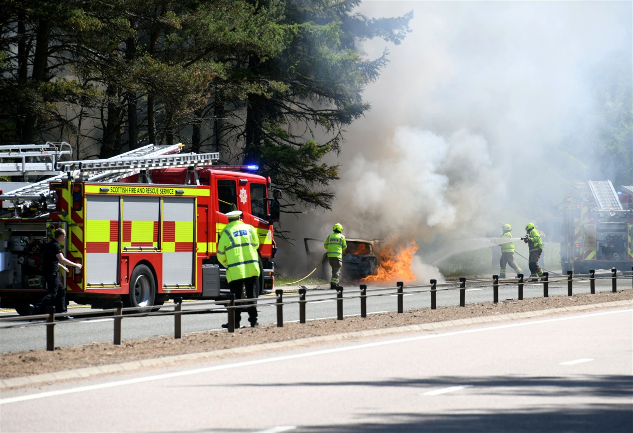 Fire crews at the scene of the car fire on the A9 just past the Tomatin junction.