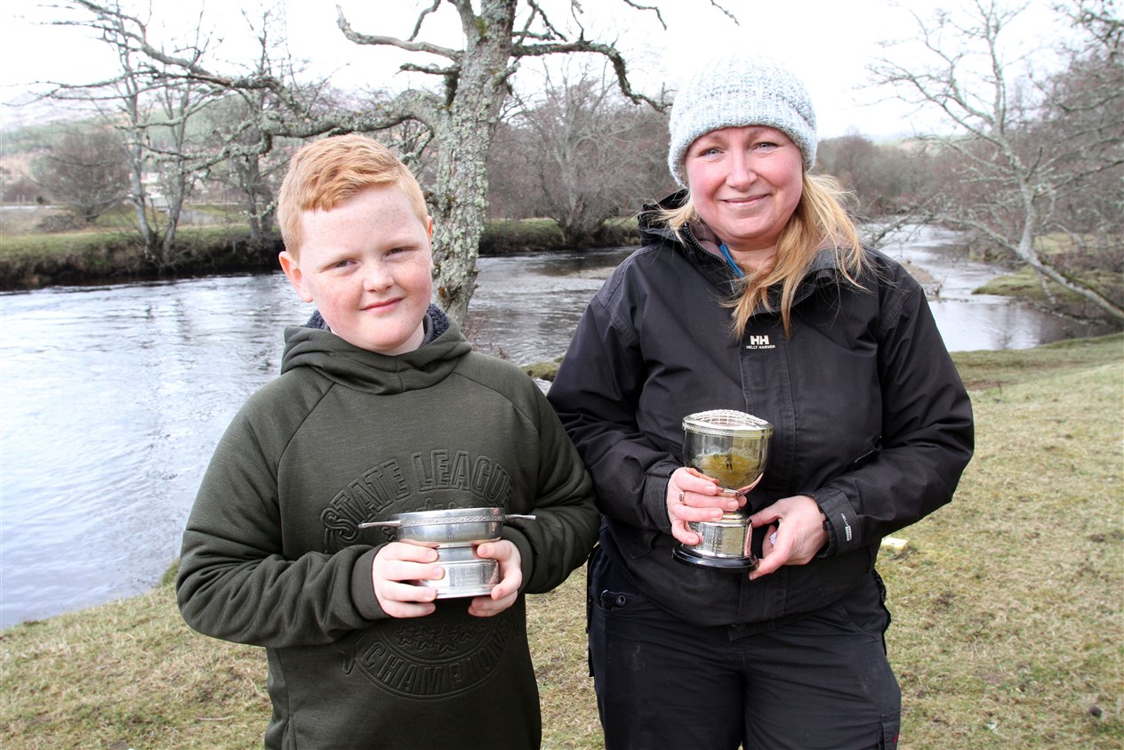UP FOR THE CUP(S): Brilliant young fisherman Brogan MacLean is already amongst the best in the Badenoch Angling Association, taking the Junior title this year. Pictured with him is Ladies’ best Jude Houghton.