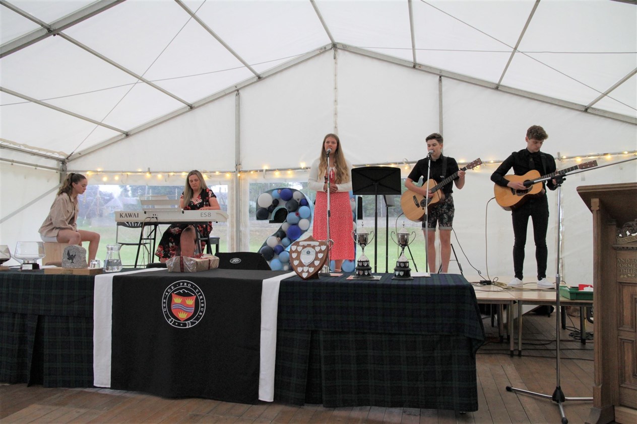 The school's musical talent put on a performance at the bash.