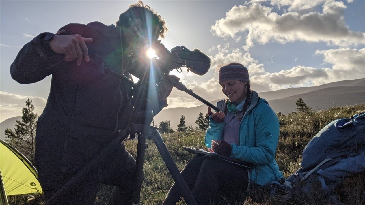 Behind the scenes, filming Cairngorms Connect Monitoring Officer Ellie Dimabro-Denson for 'Wild Isles' spring 2022.