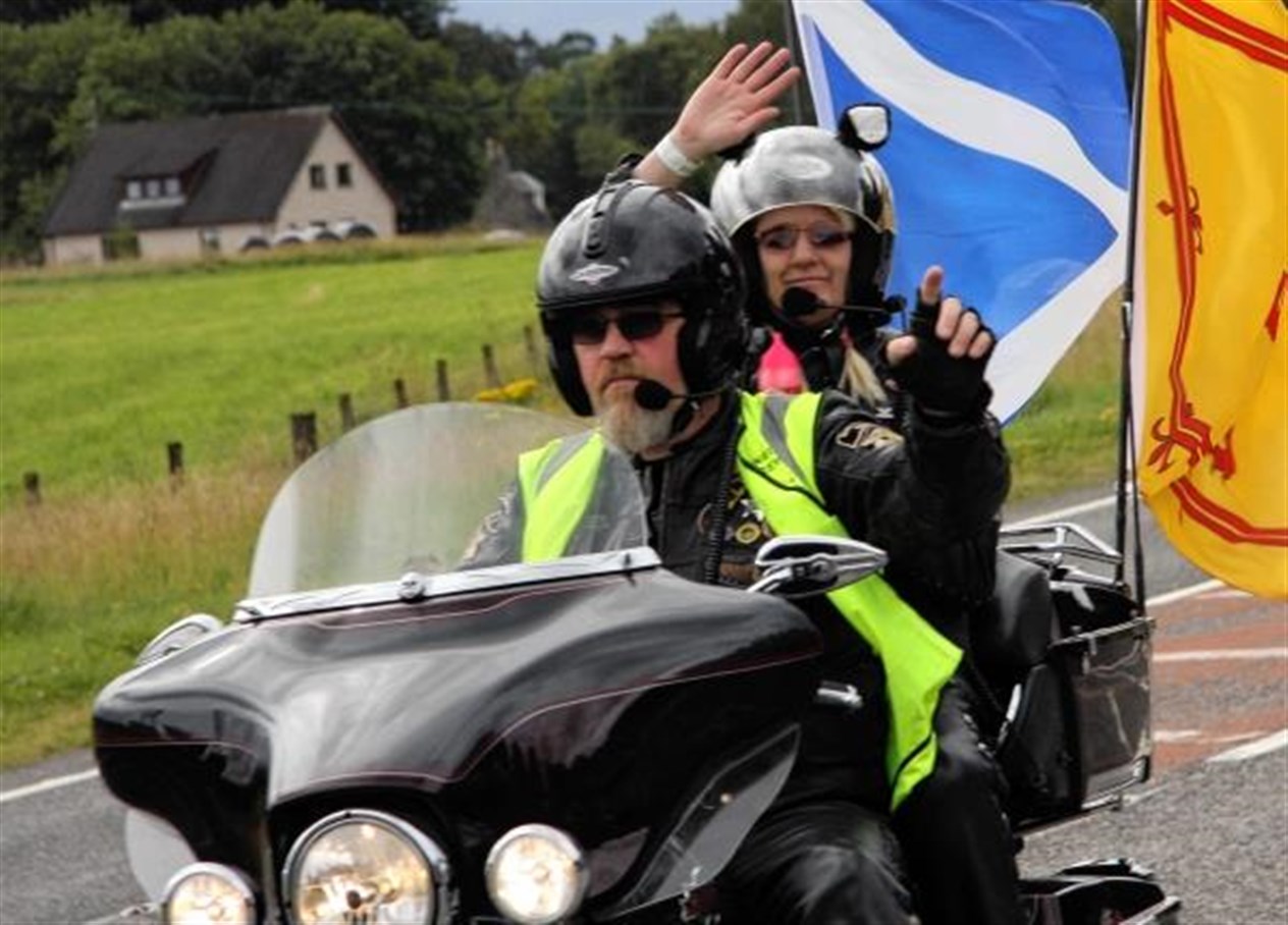 A wave from two of the Harley visitors