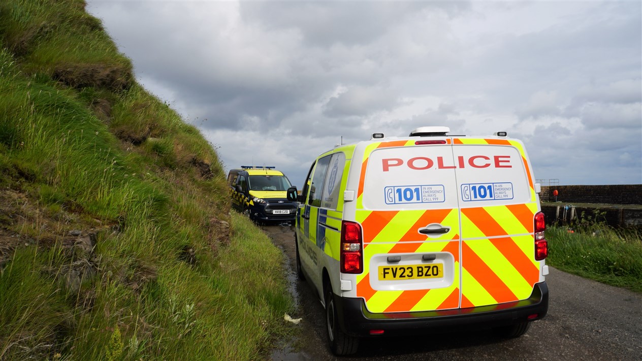Police and coastguard at Keiss harbour yesterday at 5pm. Picture: DGS