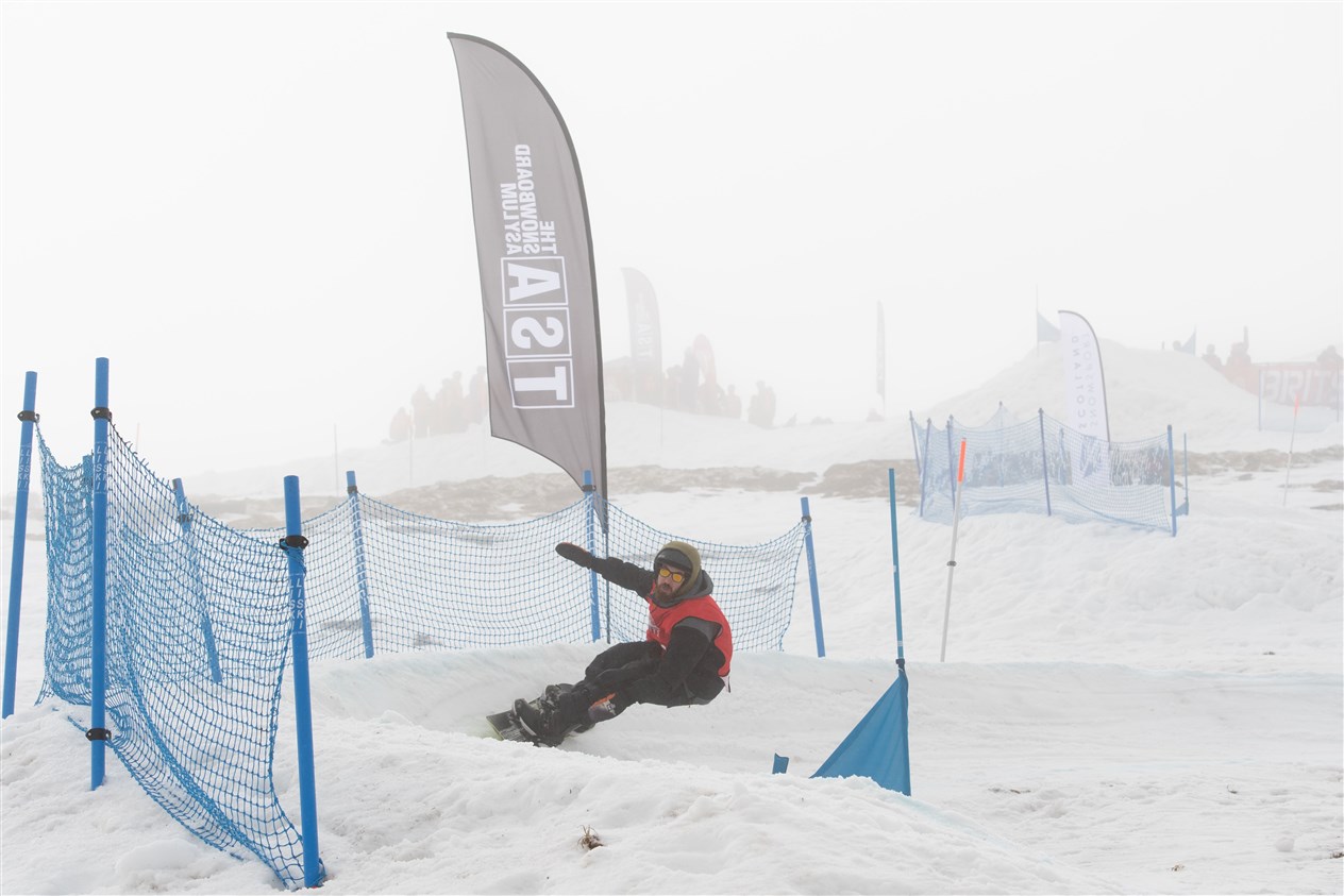 Getting a good edge in the carve on the banked slalom course.