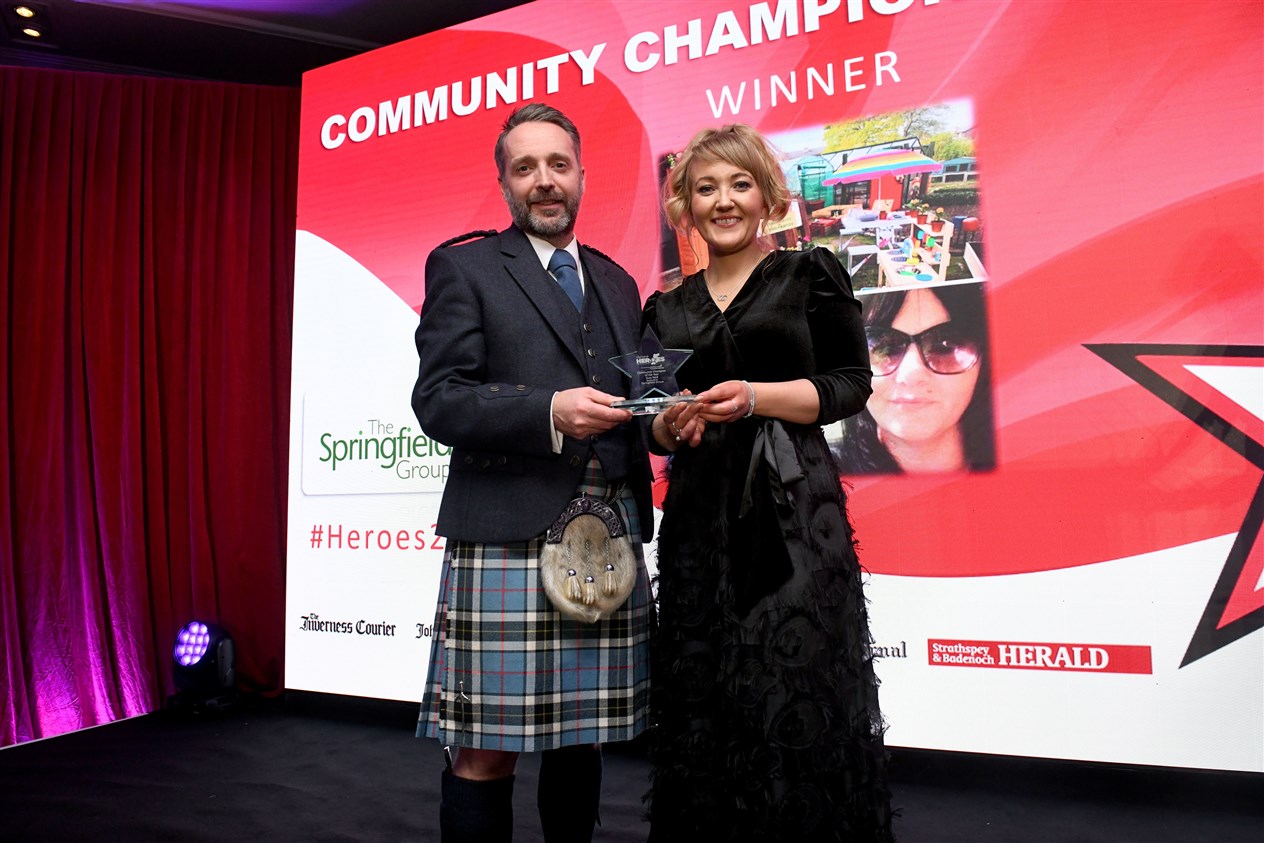 Mairi MacDonald from RBS accepted the Community Champion award on behalf of Suzy Reid who couldn't attend. Award presented by Darren Thomson of Springfield Group. Picture: James Mackenzie.