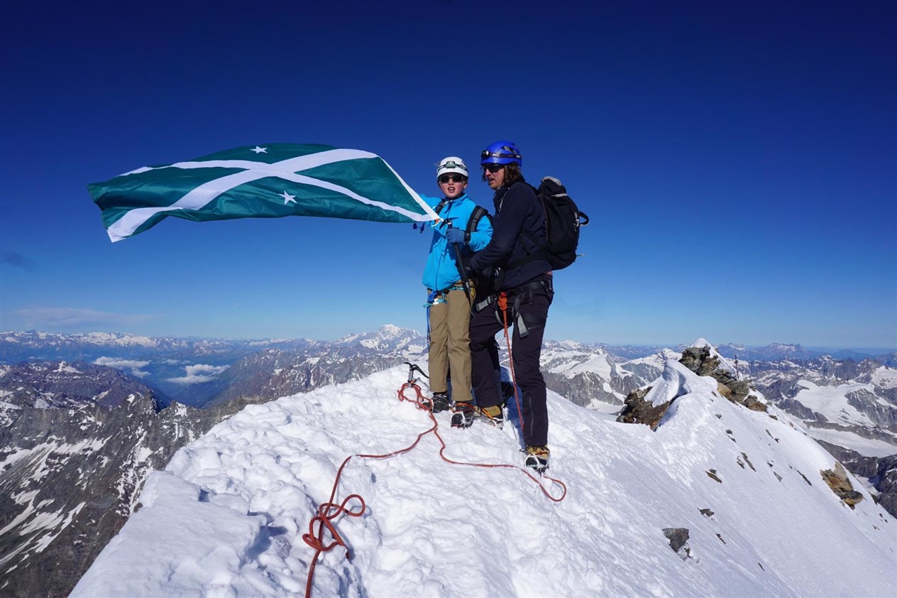 Top of the world! Jules and Chris at the summit of the iconic peak.