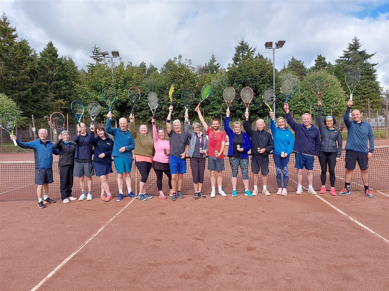 Rackets aloft from all of those who took part in the LTA tournament.