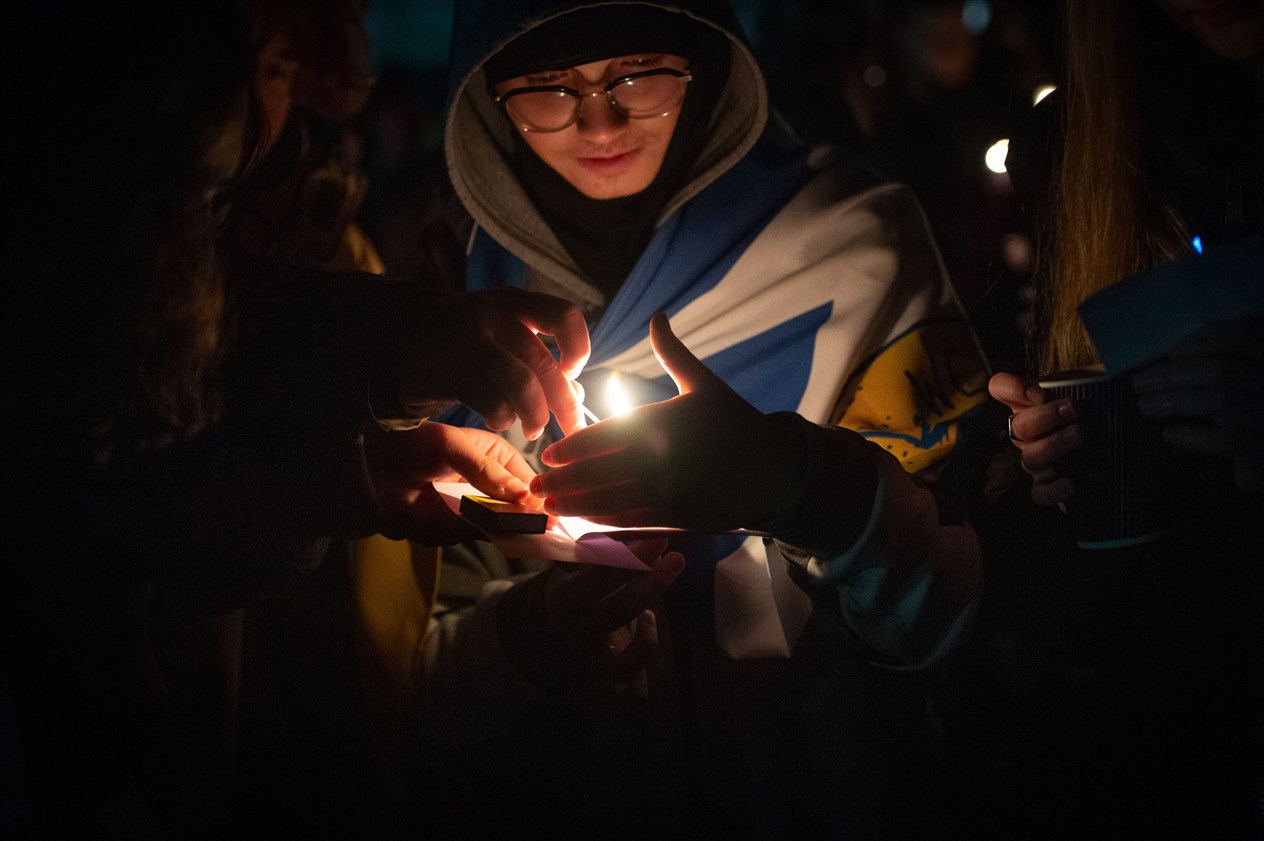 Boy with candle. Picture: Callum Mackay..