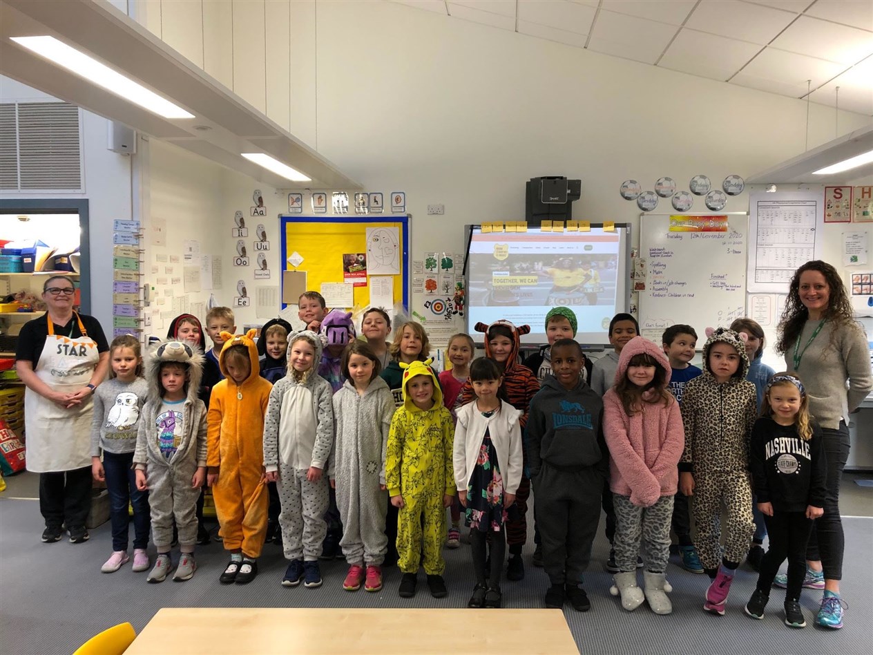 Pupils in P3/4 in their Children in Need feelgood outfits.