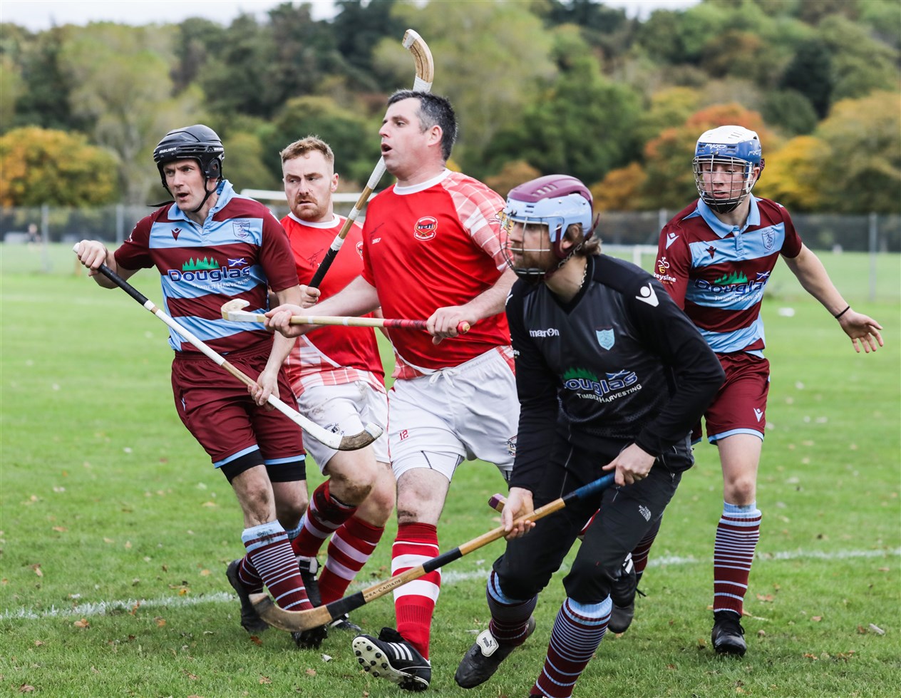 Inverness and Strathglass in action at Bught Park , Inverness during the Mòd Shinty Cup match, Inverness won on penalties - The Royal National Mòd 2021 Inverness, Scotland, 9/10/21
