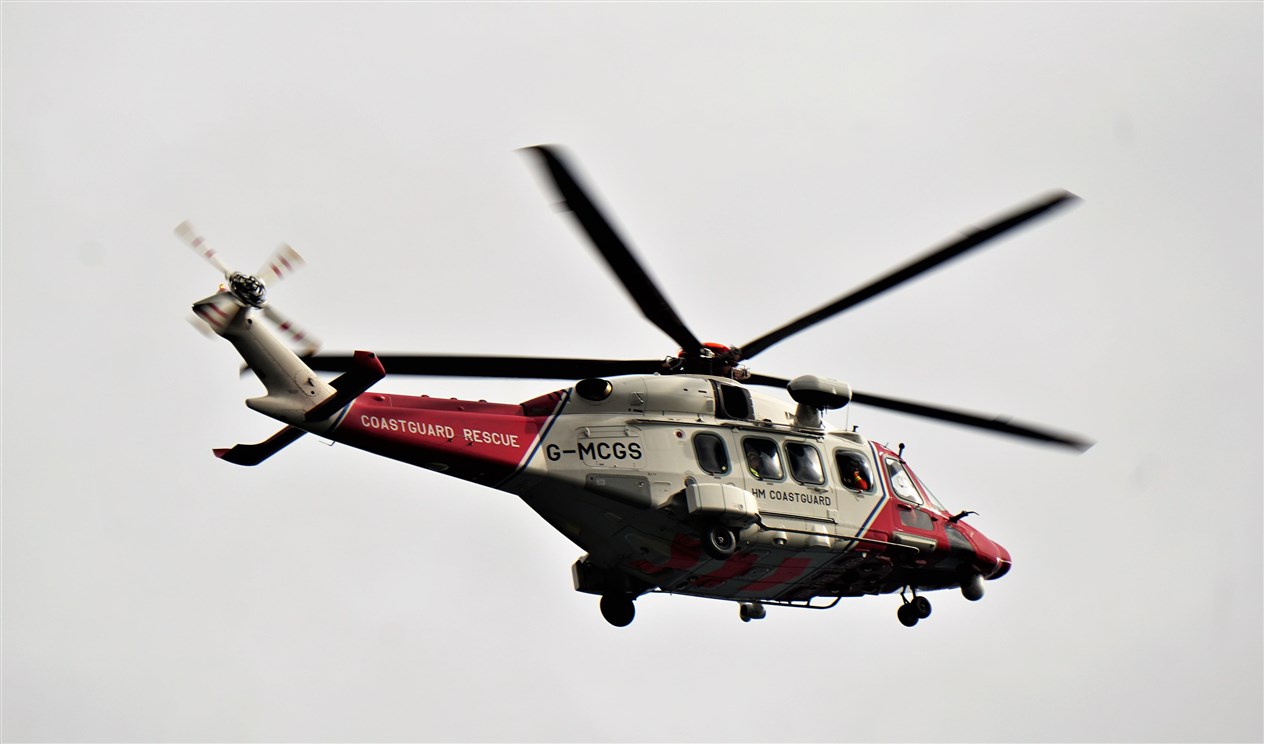 The Inverness based Rescue 151 search and rescue helicopter attended the scene. Picture: DGS