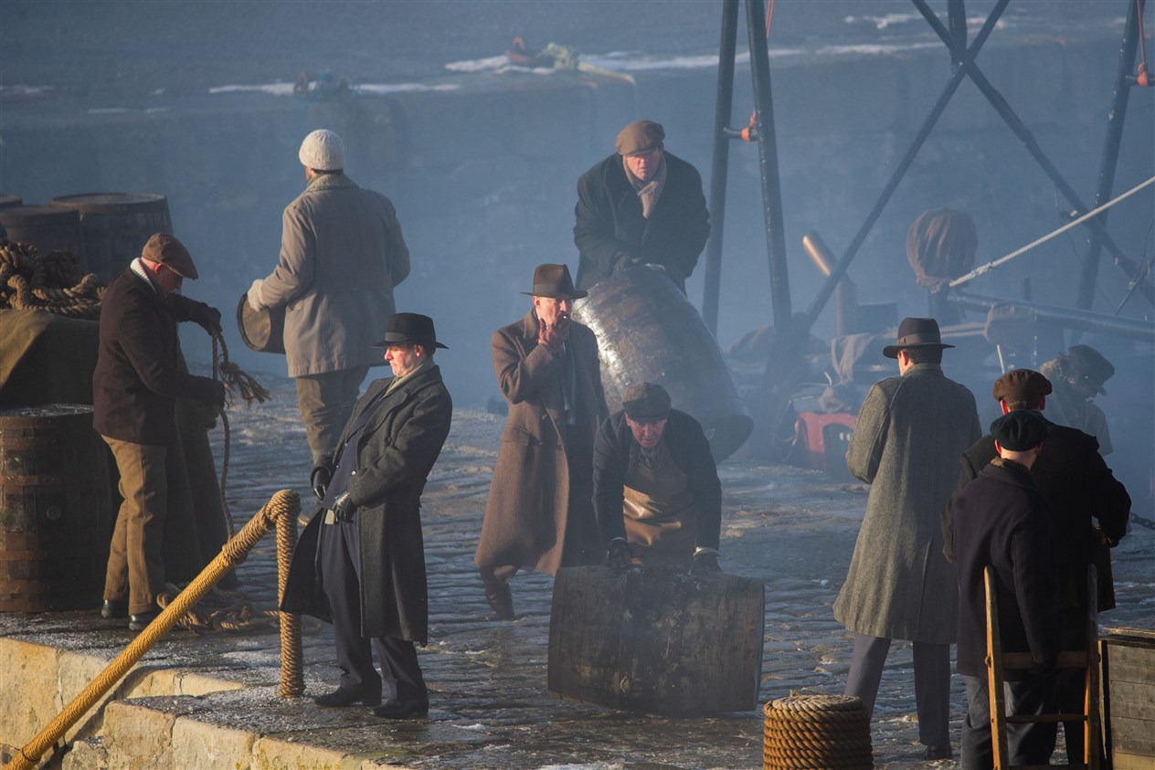Michael Gray, played by Finn Cole, is involved with the final days filming at Portsoy as the cast and crew film on the new harbour. ..Picture: Daniel Forsyth..