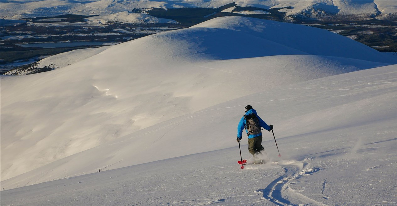Hannah Bailey enjoying some well earned turns in fresh powder in the Cairngorms.