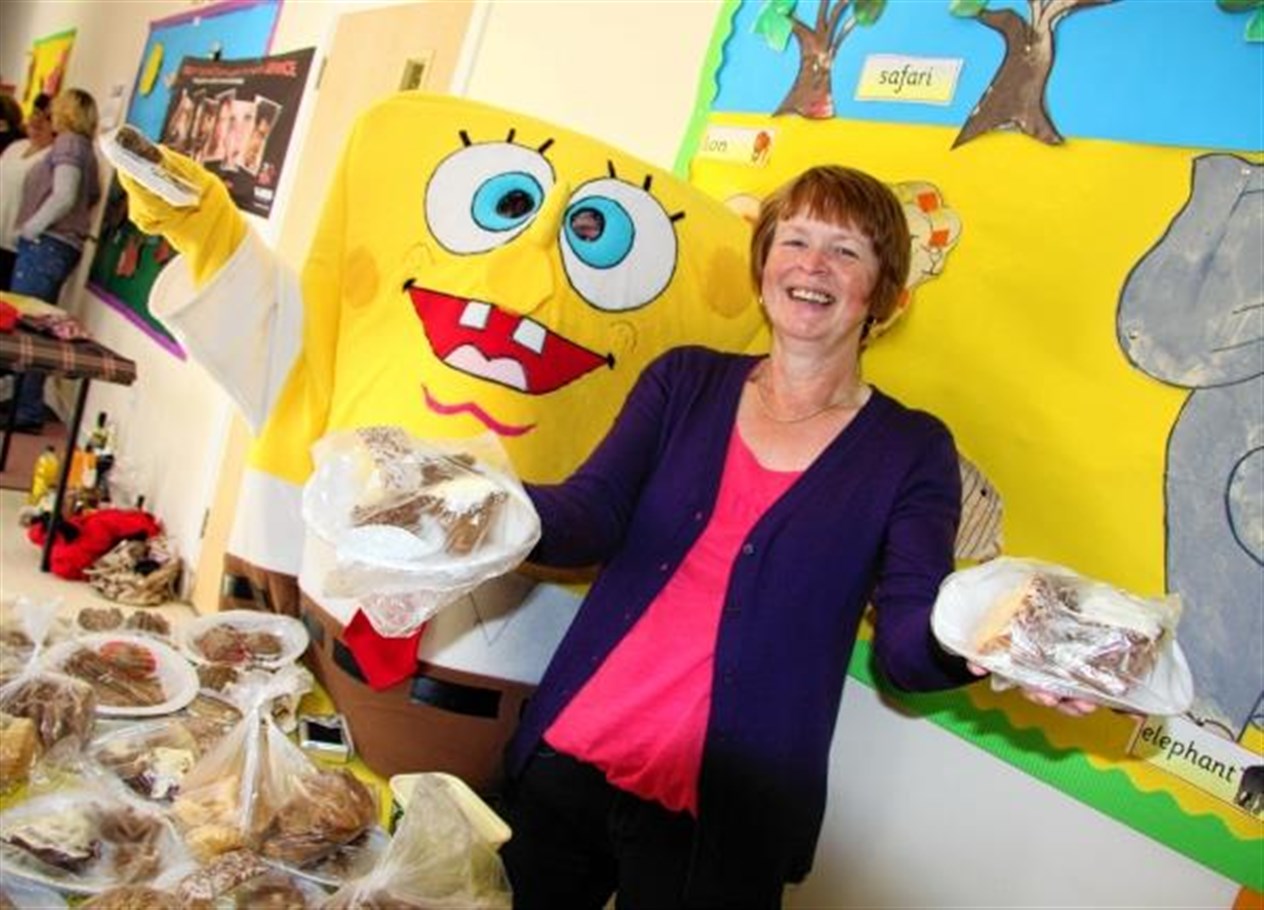 Spongebob Squarepants helps Morag McIver at the cake stall