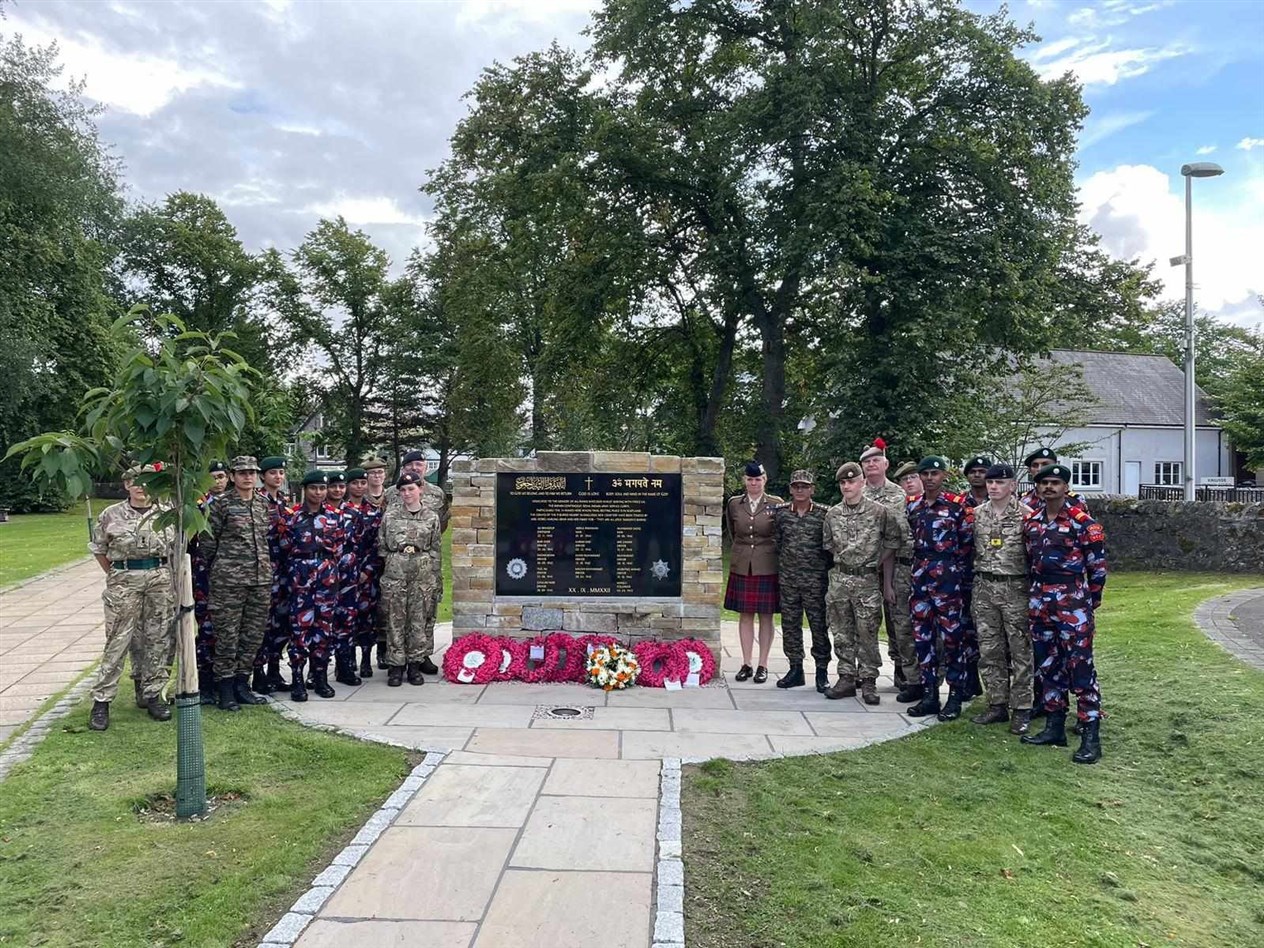 Indian army cadets and their hosts gathered at the Force K6 monument.