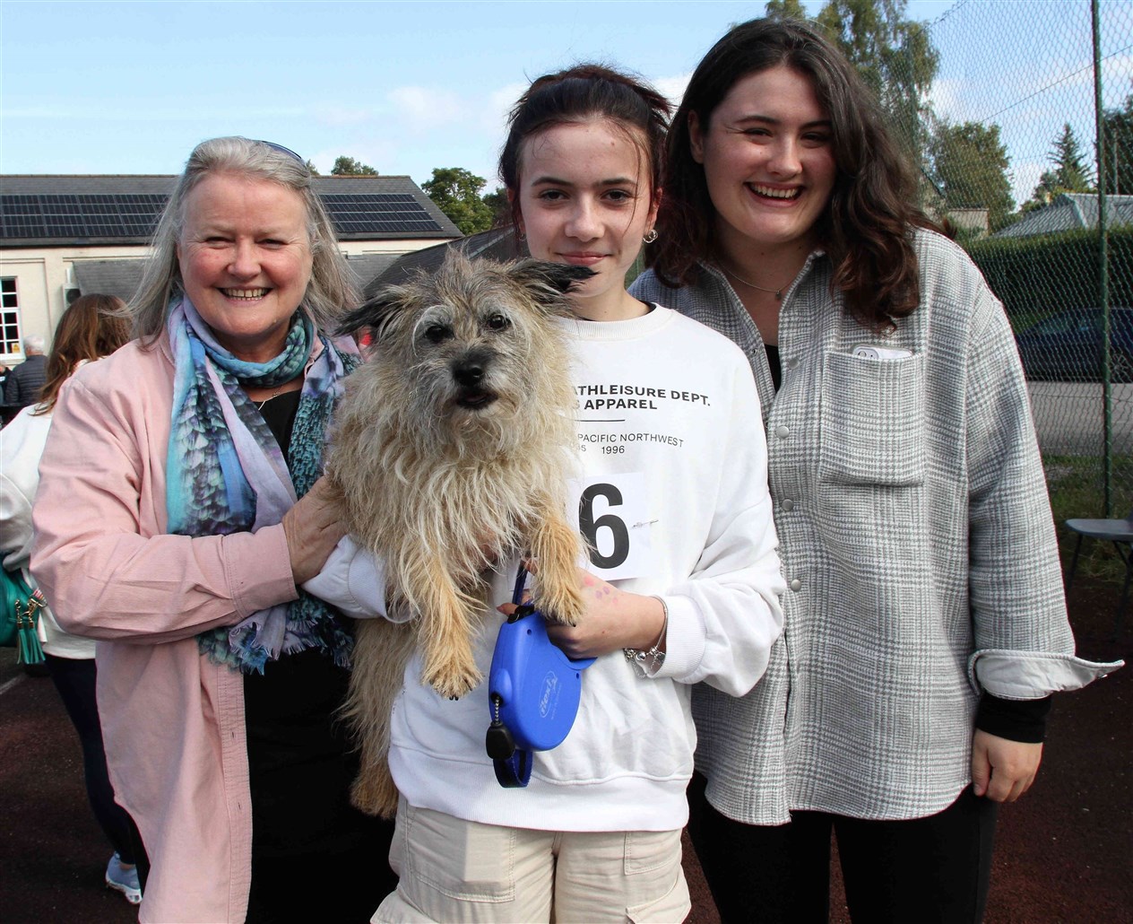 ONE OF THE FAMILY: Mhairi Crawford-McKee with daughters Isla and Eva, and Kuri.