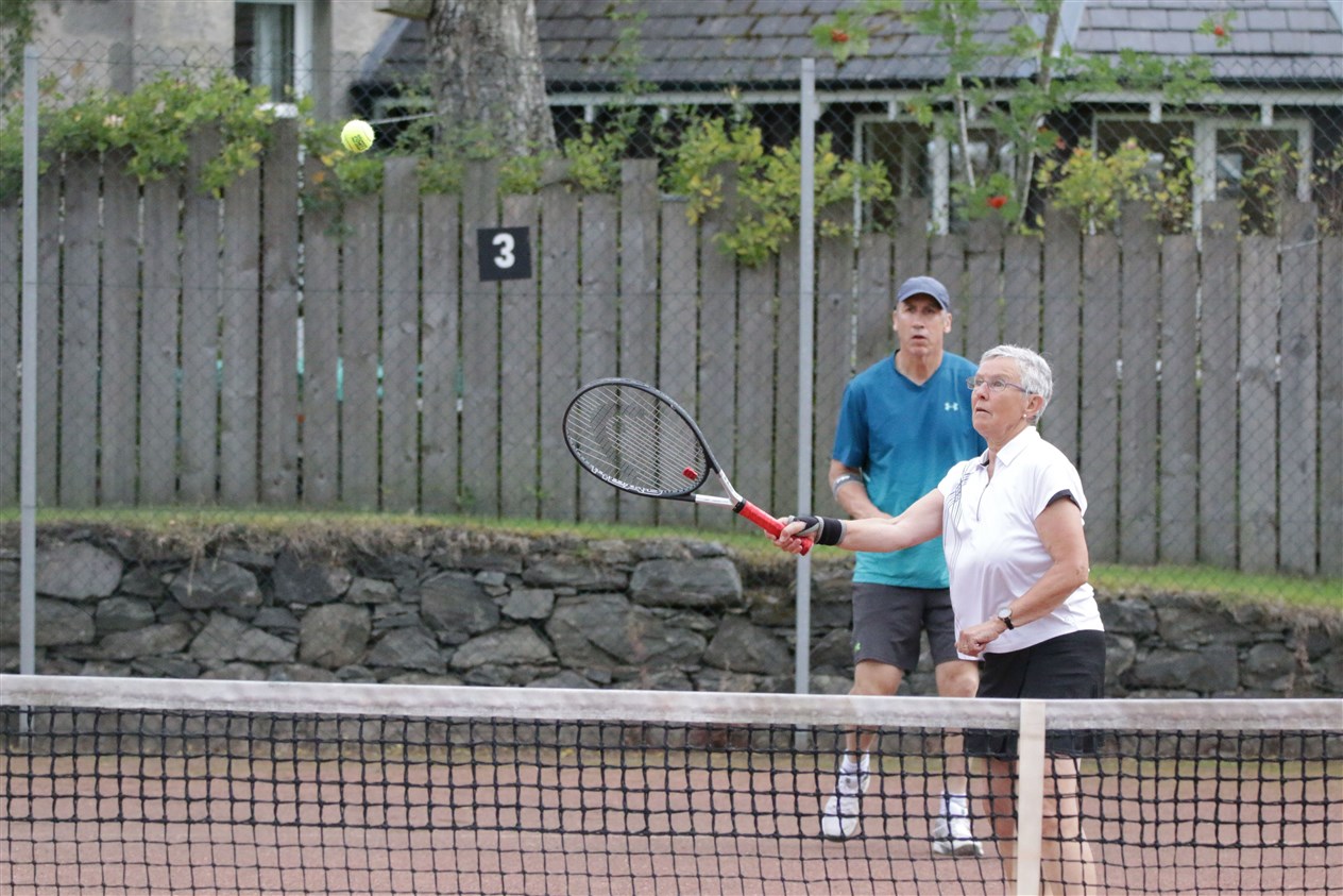 Moira Webster and Grant Davis keep a close eye on the ball.
