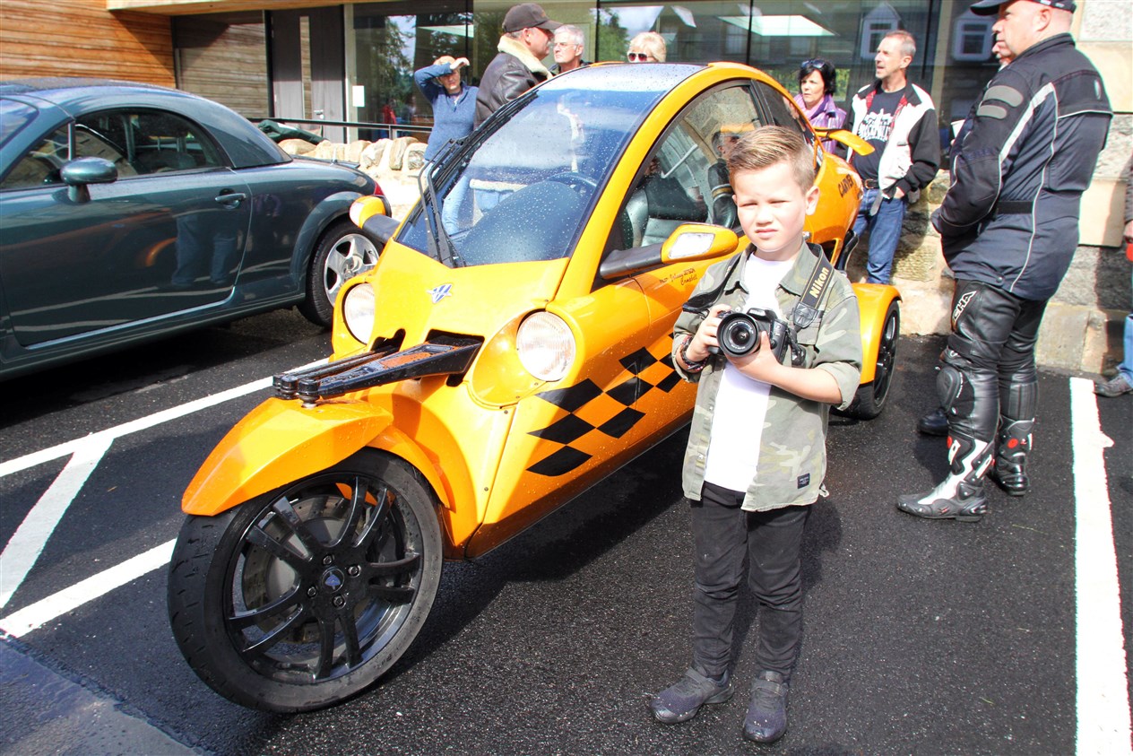 Finlay Gethins (7) beside a Carver Speciale.