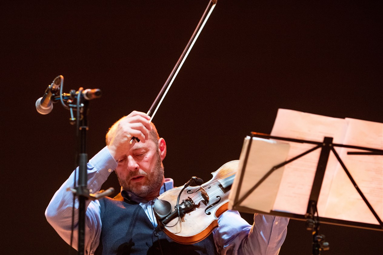Iain MacFarlane of Glenfinnan Ceilidh Band performs on stage at Eden Court Theatre on the openng night of live music, The Royal National Mòd 2021