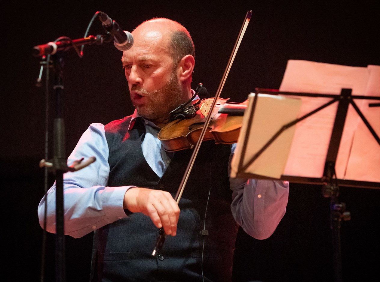 Iain MacFarlane of Glenfinnan Ceilidh Band performs on stage at Eden Court Theatre on the openng night of live music, The Royal National Mòd 2021