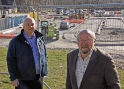 Willie McKenna, chair of the Aviemore Community Centre Company (front) and director Bill Lobban beside what will be the new playing field at Aviemore