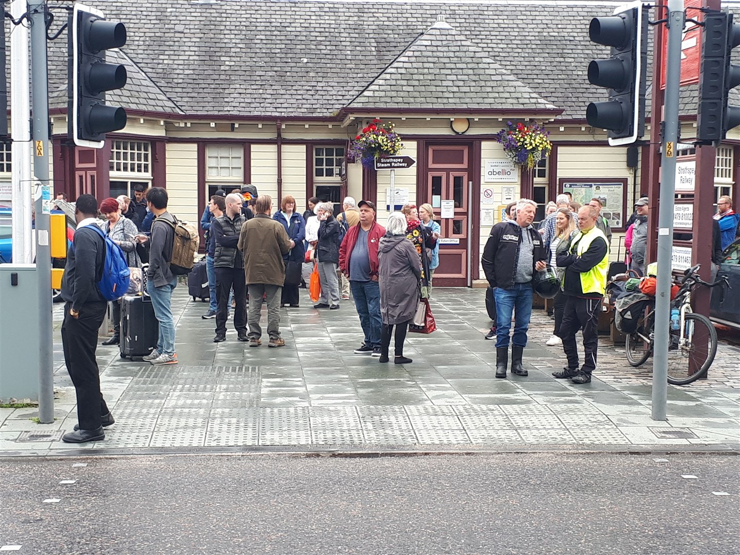 Another trainload of passengers waits at Aviemore for a bus