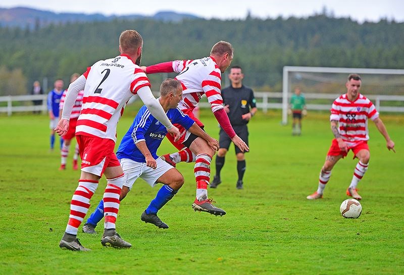 A congested midfield in Saturday's Scottish Junior Cup clash.