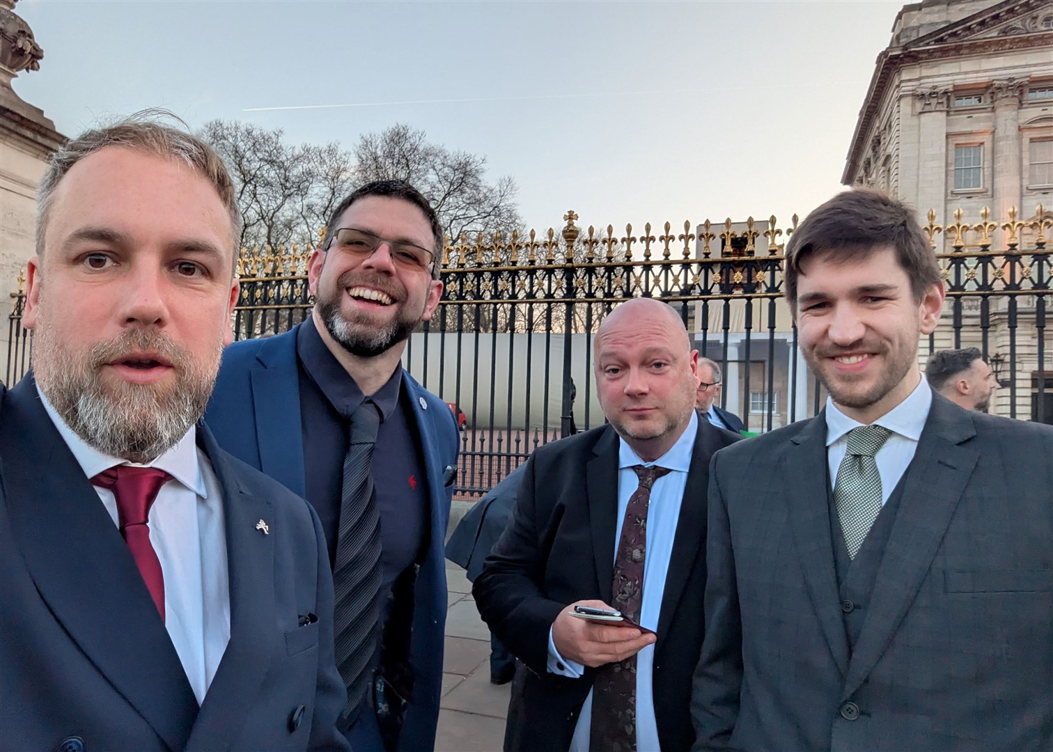 Scott Maclennan, Andy Dixon, Alasdair Fraser and Lewis McBlane outside Buckingham Palace.