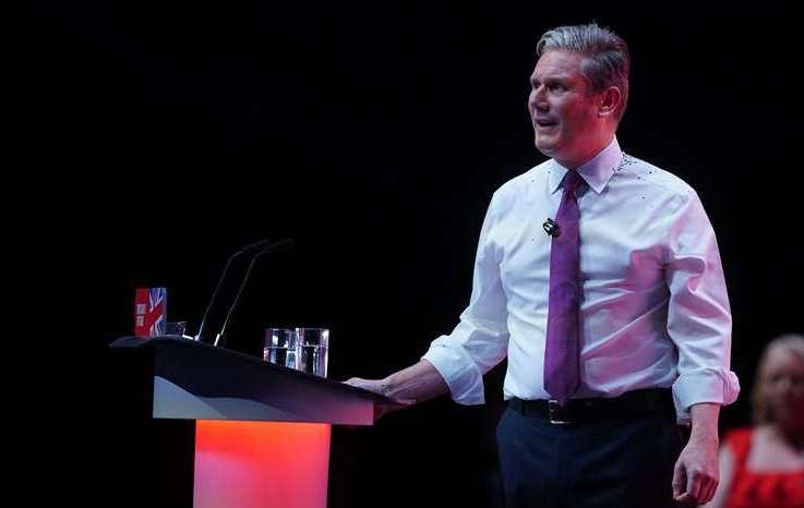 Labour leader Sir Keir Starmer making his keynote carried on with his speech after the glitter disruption (Peter Byrne/PA)