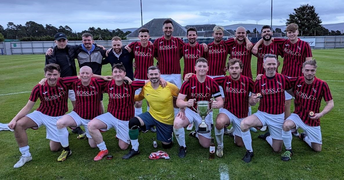 Aviemore Thistle show off the MacLean Cup after their 2-1 win which capped another memorable season for the Jags.