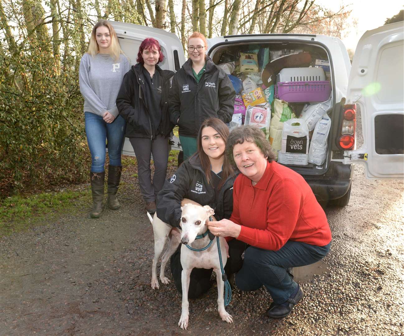 Iona Nicol and Max of Munlochy Animal Aid receiving a donation from Crown Vets. Picture: Gary Anthony.