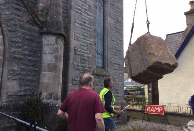 STONE ME: The Wolf of Badenoch sculpture will have a rock solid base at Kingussie after the stone was safely installed last week