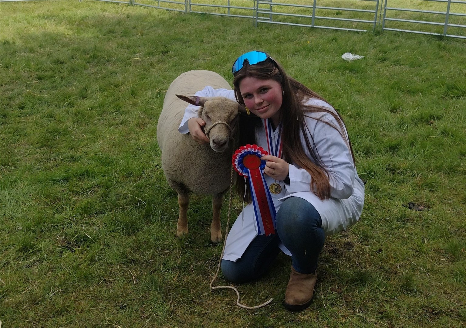 Swan song: for Grantown Grammar School student Macey Henderson (16) of Dulnain Bridge, it was a final fling as the show's best young handler. As she led out Bunny, her beautiful eight-month old Charollais, for the judging she told the Strathy it was the last year she would qualify as young!