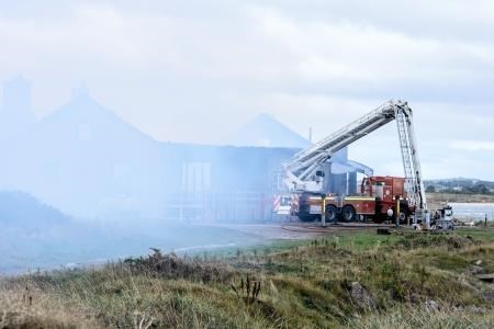 The fire spread to a nearby area of gorse.
