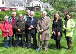 Dr Michael Simpson cuts the first sod at the Lawson Hospital site