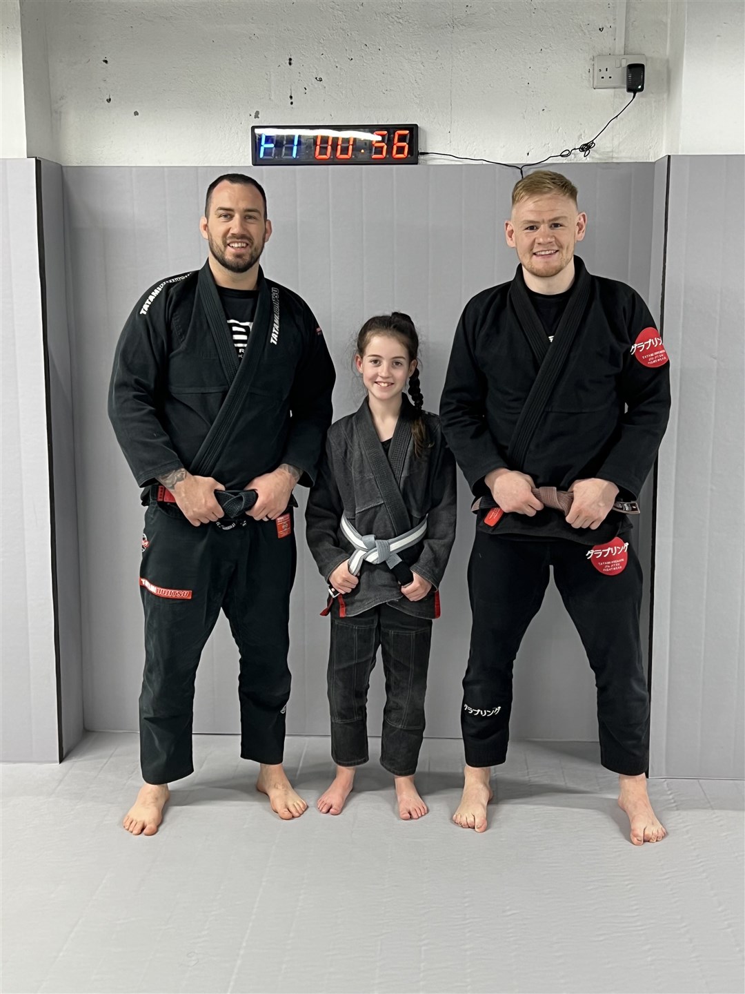 Niamh Ross (centre) is one of Mikeysline’s new Bee the Change Champions. She is pictured here with SBG Moray coaches Martin Donaldson (left) and Kevin McAloon.