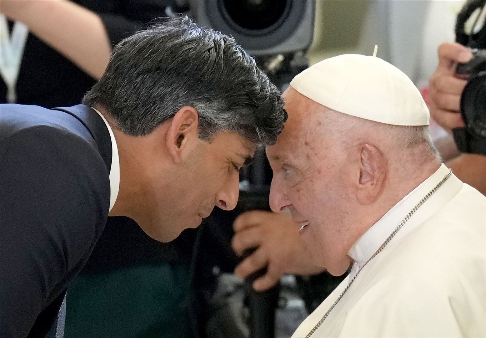 Then-prime minister Rishi Sunak welcomed the Pope ahead of a session during the G7 leaders’ summit in Puglia Italy in June last year (PA)