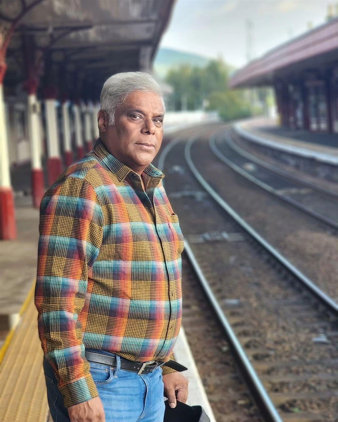 Ashish Vidyarthi on the platform at Aviemore's listed railway station.