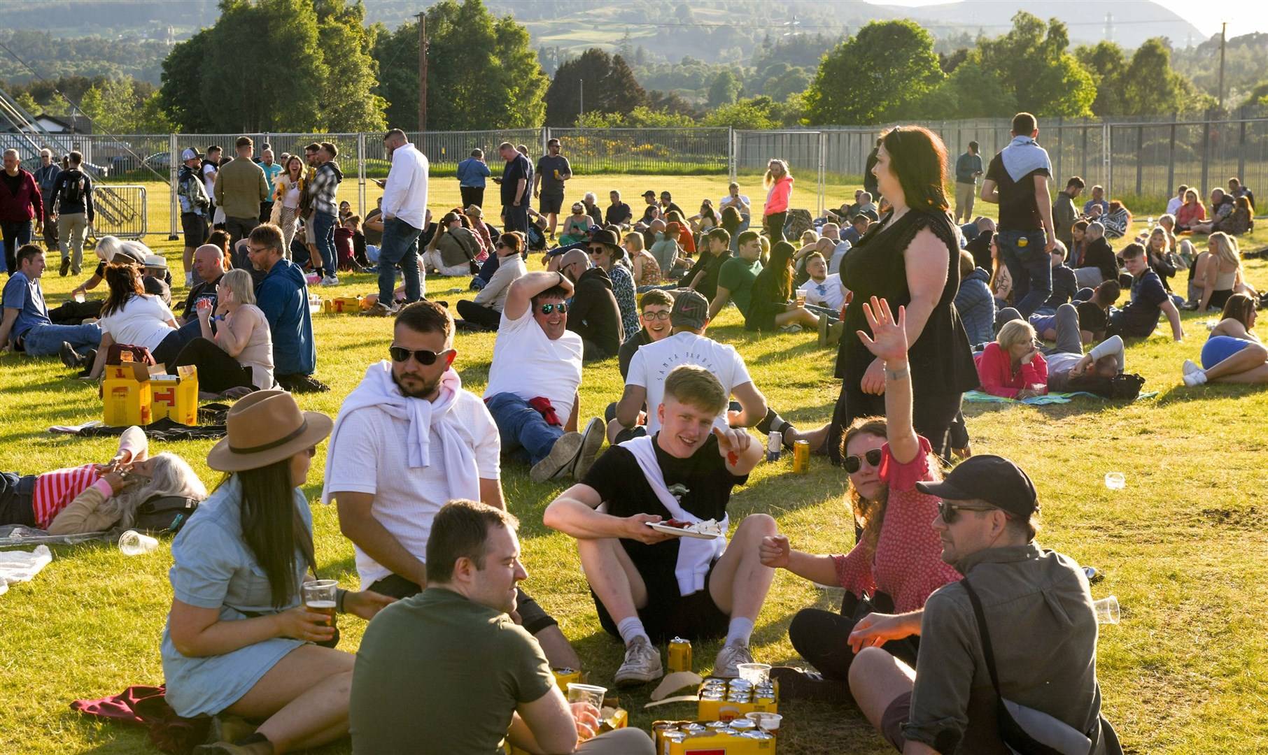 Festival-goers enjoy the sunshine. Picture: James Mackenzie.